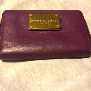 Gently used purple Marc Jacobs wallet /wristlet